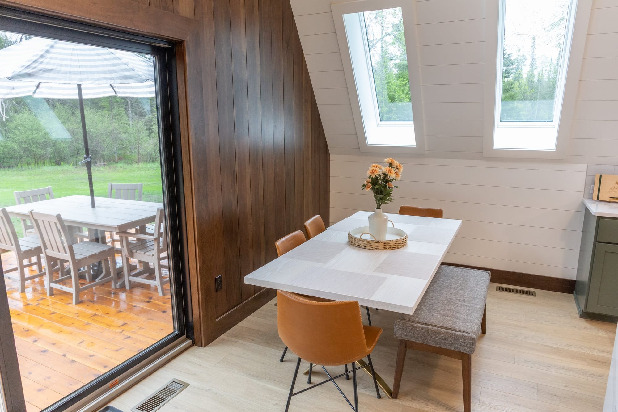 Dining table beside the window wall