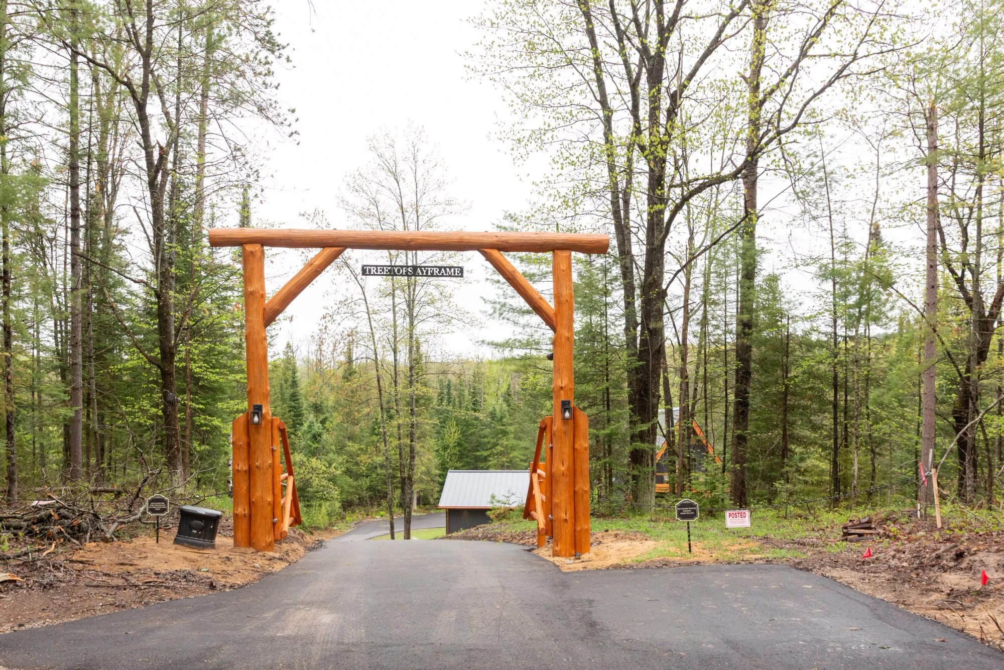 The timber gateway over the drive into the property