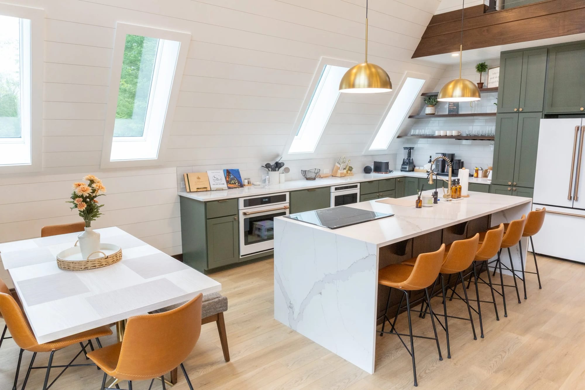 The kitchen seen the length of the great room