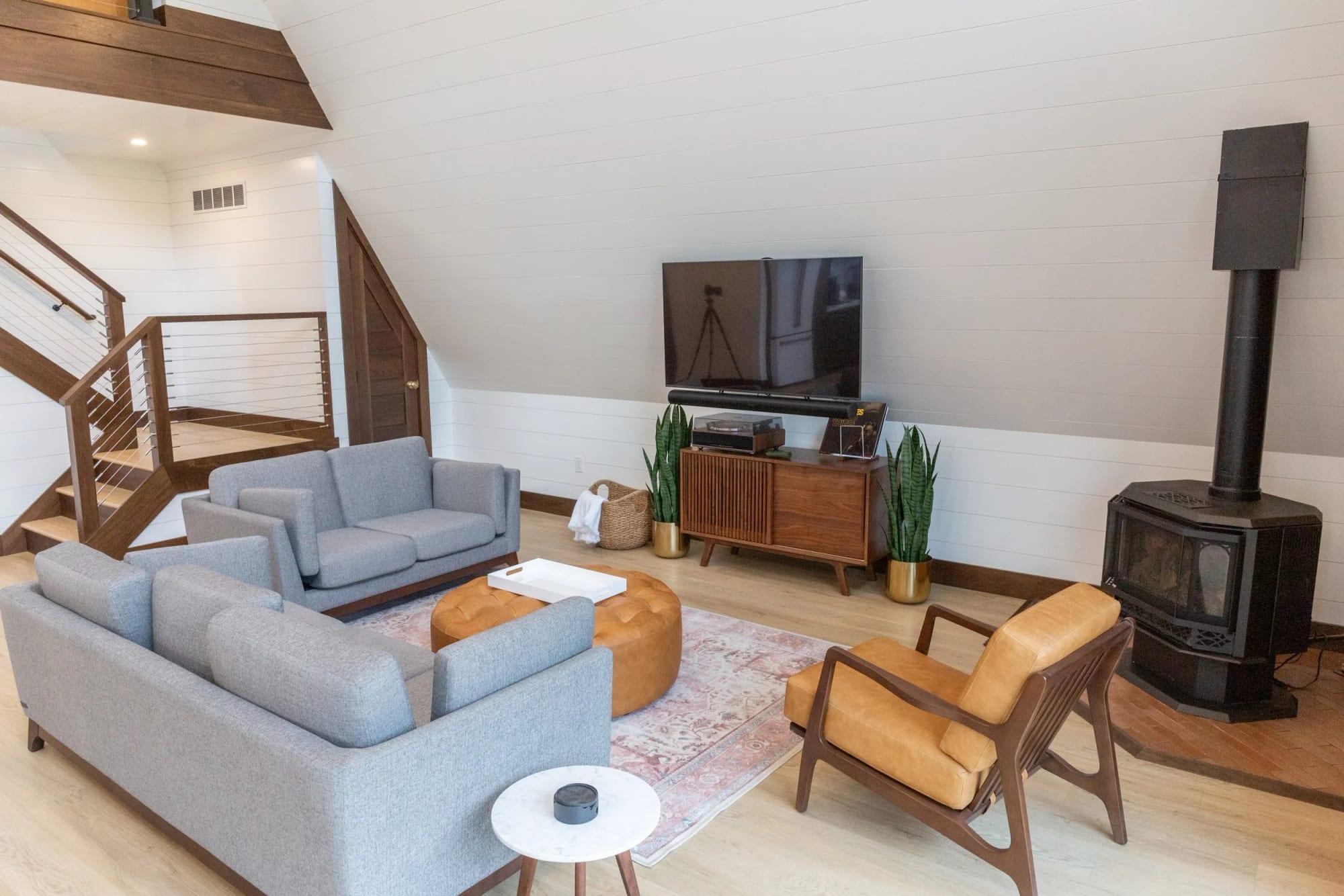 Seating around the wood stove in the great room
