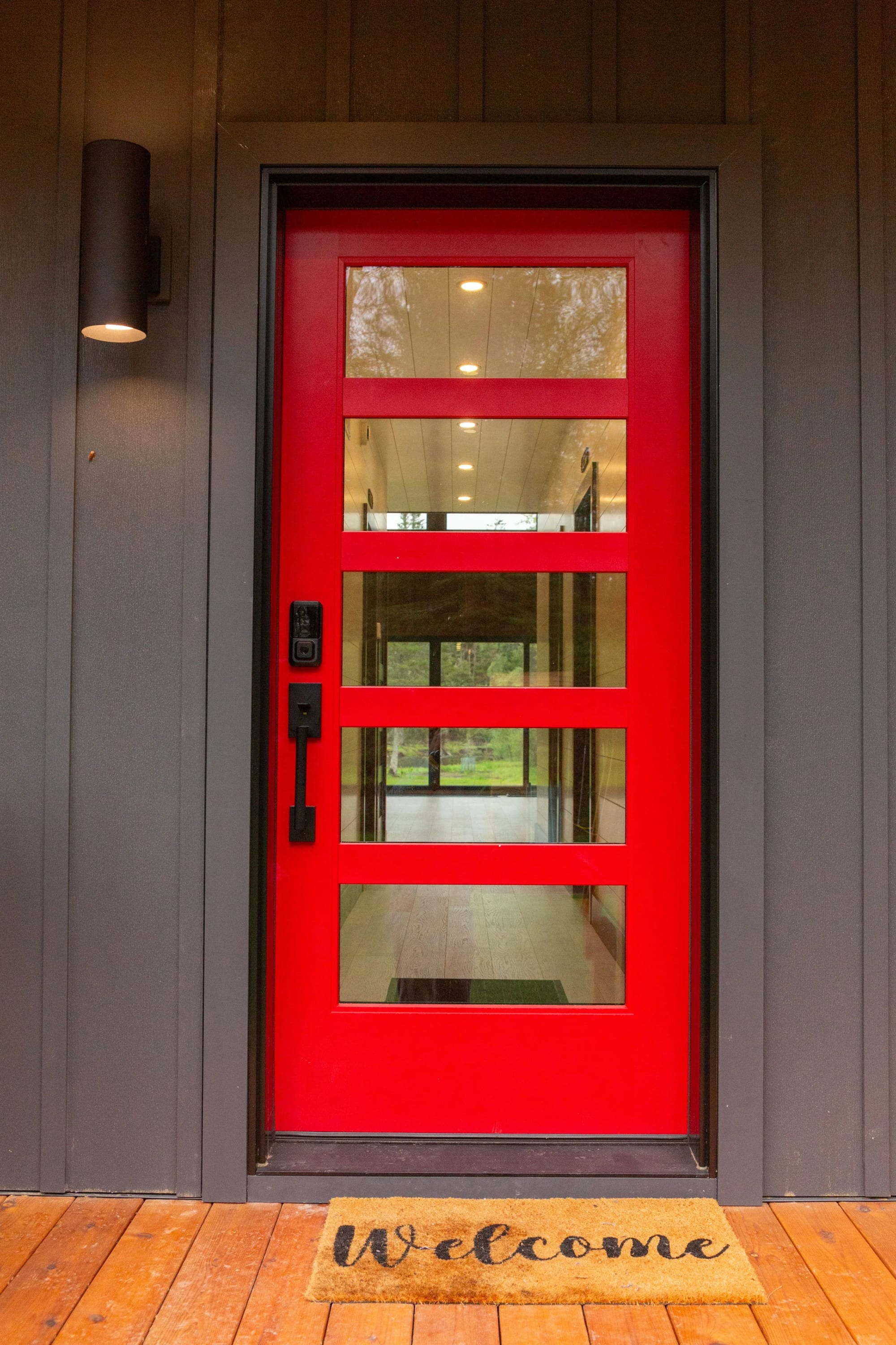 The red front door under the gable
